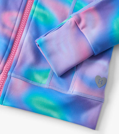 Purple and blue tie-dye active jacket with a pink zipper and heart logo detail on the sleeve.