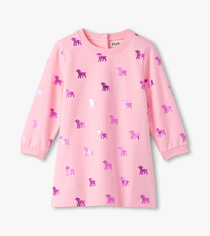 Pink long-sleeve dress featuring a lamb silhouette pattern in various shades of purple.