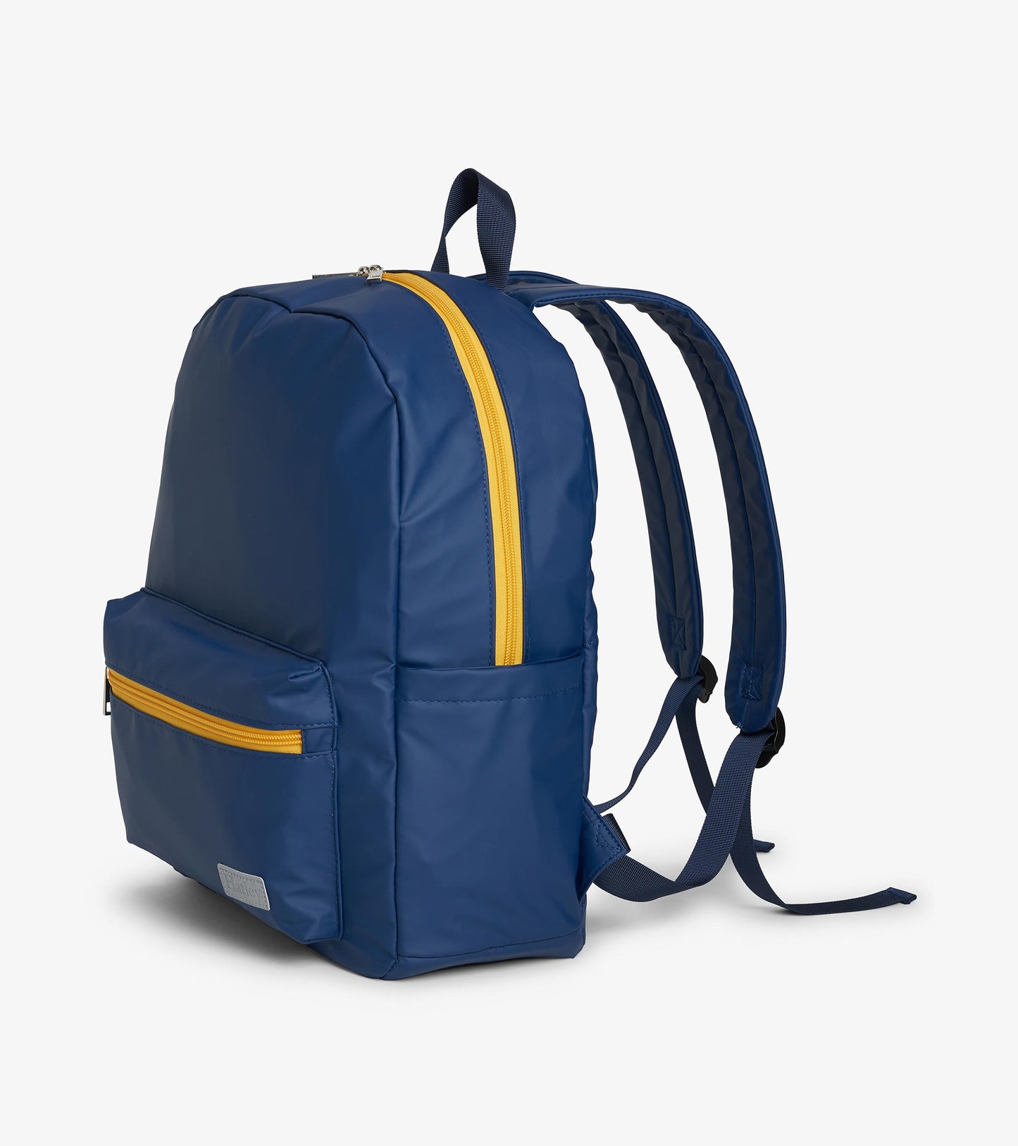 Side view of navy backpack with yellow top zipper, front pocket, top handle, and adjustable straps