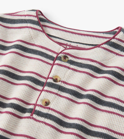 Oatmeal melange waffle henley featuring horizontal stripes in burgundy, navy, and cream with three buttons at the neckline.
