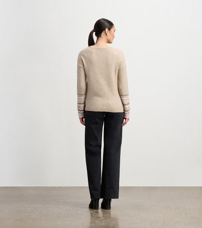 Oatmeal melange sweater with patterned cuffs, featuring a relaxed fit and long sleeves, viewed from the back.