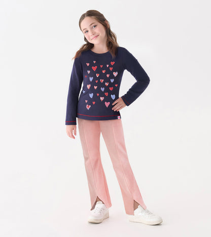 Navy long sleeve tee featuring a colorful heart pattern, paired with light pink pants, suitable for casual wear.