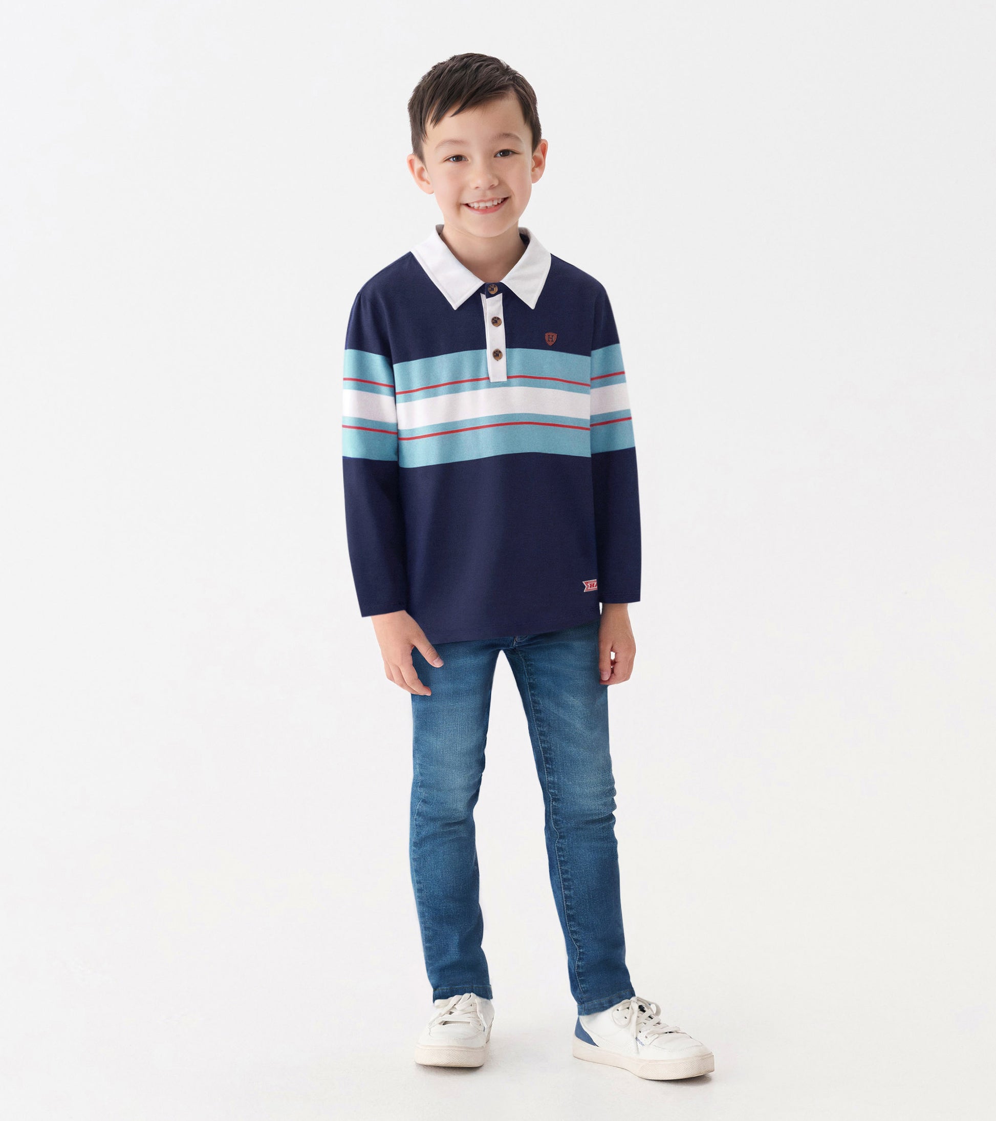 Boys' long-sleeve rugby polo in navy with blue and white stripes, featuring a collared neckline and button placket.