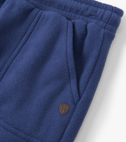 Patriot blue polar fleece joggers featuring side pockets and an elastic waistband for comfort.