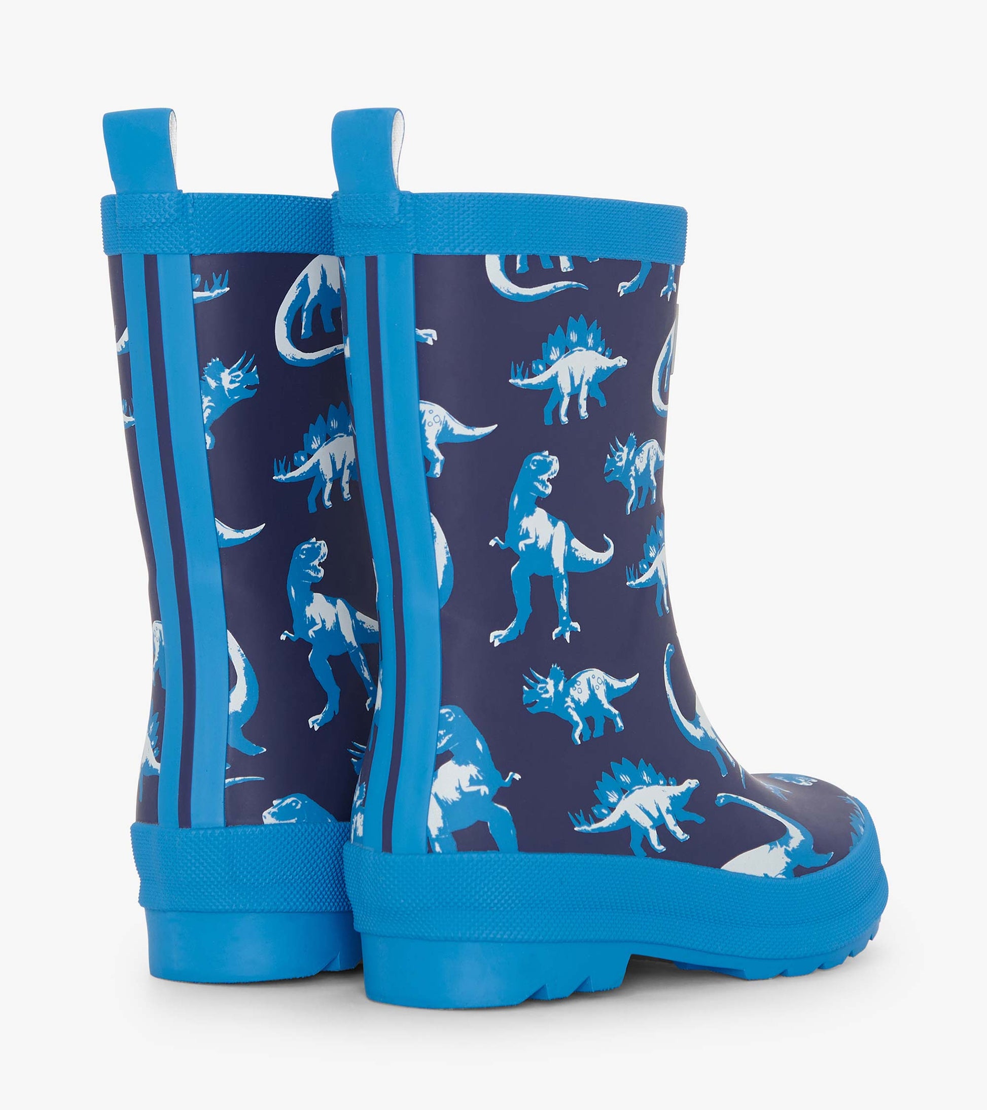 Blue matte rain boots featuring a dinosaur pattern on a navy background, designed for boys.