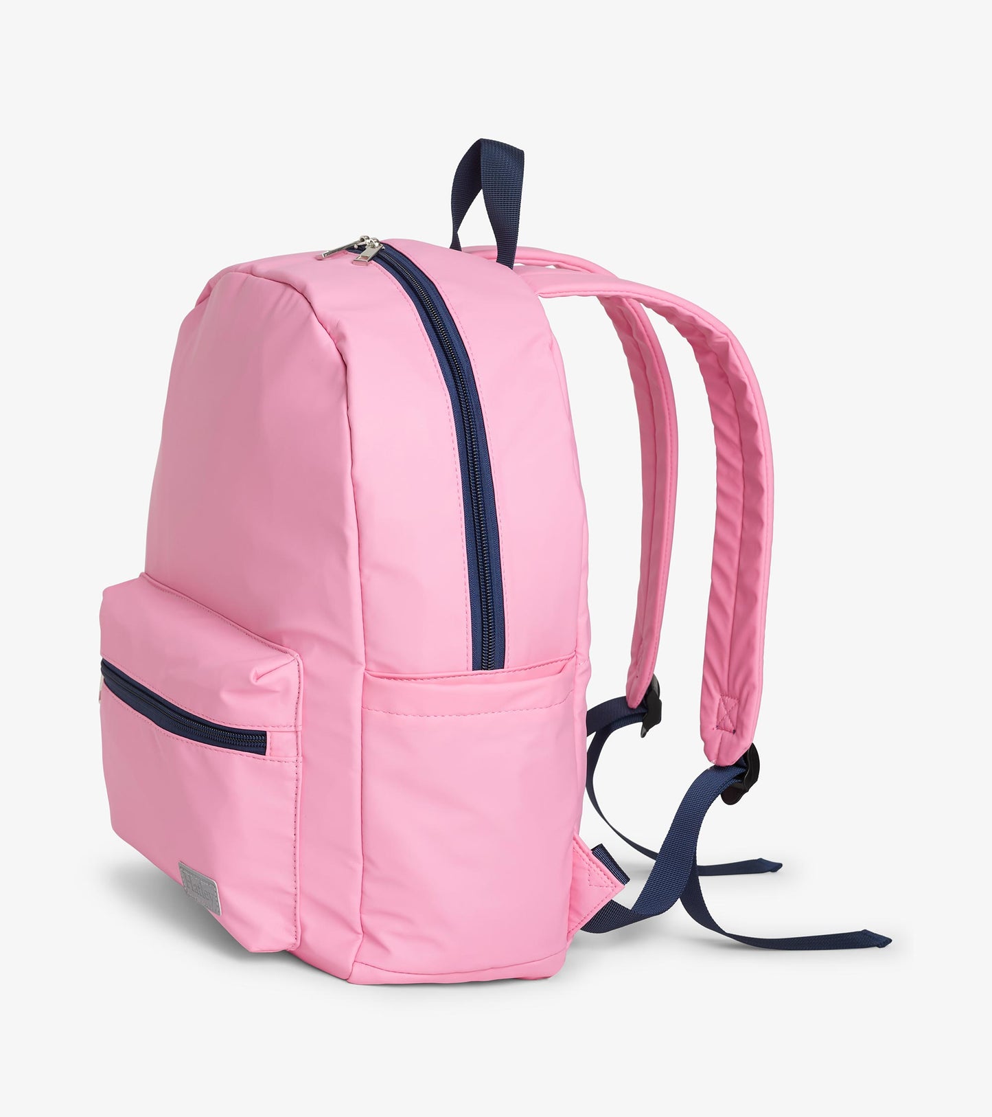 Side angle of pink backpack with navy top zipper, front pocket, and adjustable shoulder straps