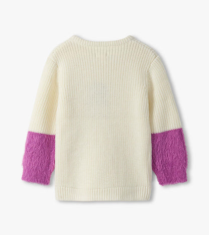 Cream sweater with fluffy purple sleeves, featuring a textured knit design and a classic crew neckline.