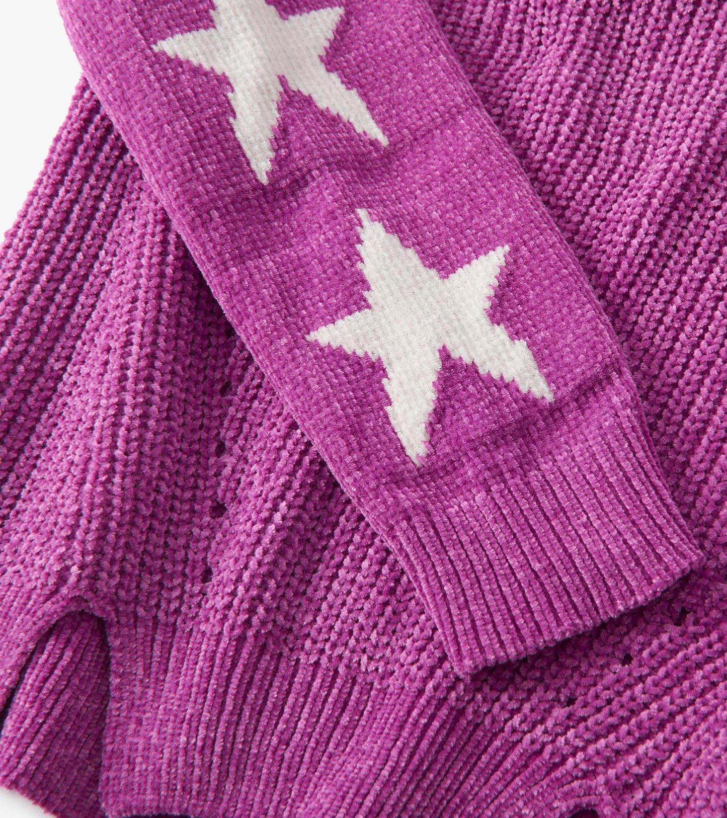 Radiant orchid chenille pullover sweater with white star patterns and textured knit design.