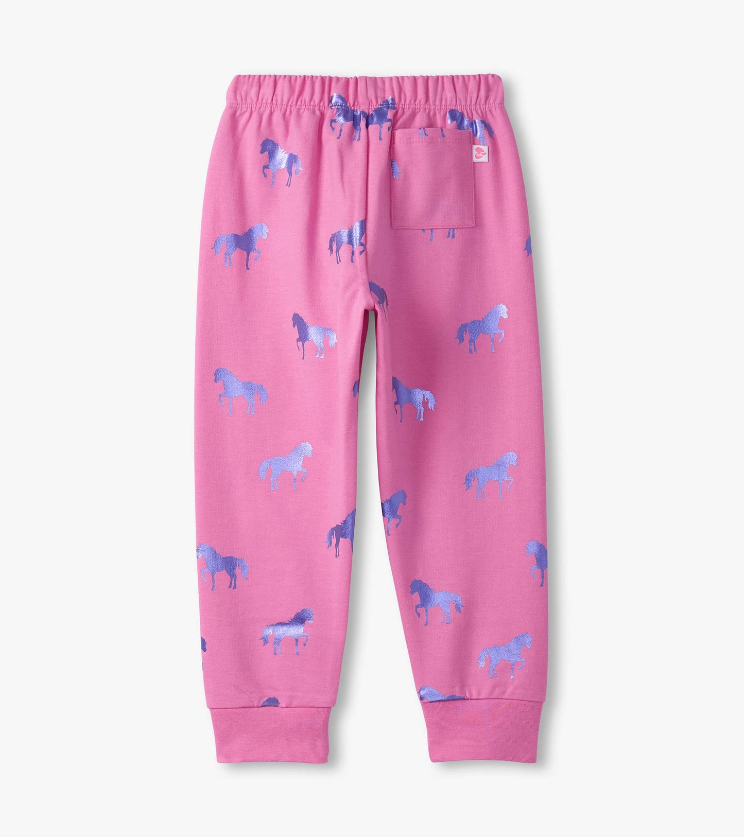 Pink cuffed track pants featuring a playful horse pattern in shades of blue, with an elastic waistband and a back pocket.
