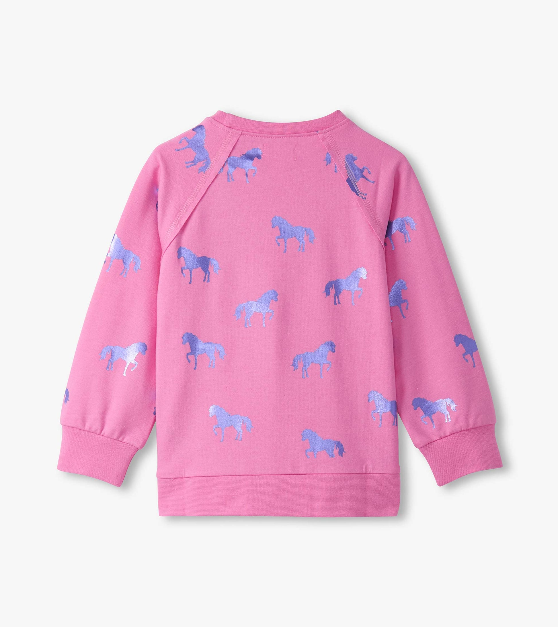 Pink sweater featuring a pattern of blue shimmer horses, with long sleeves and a crew neckline.