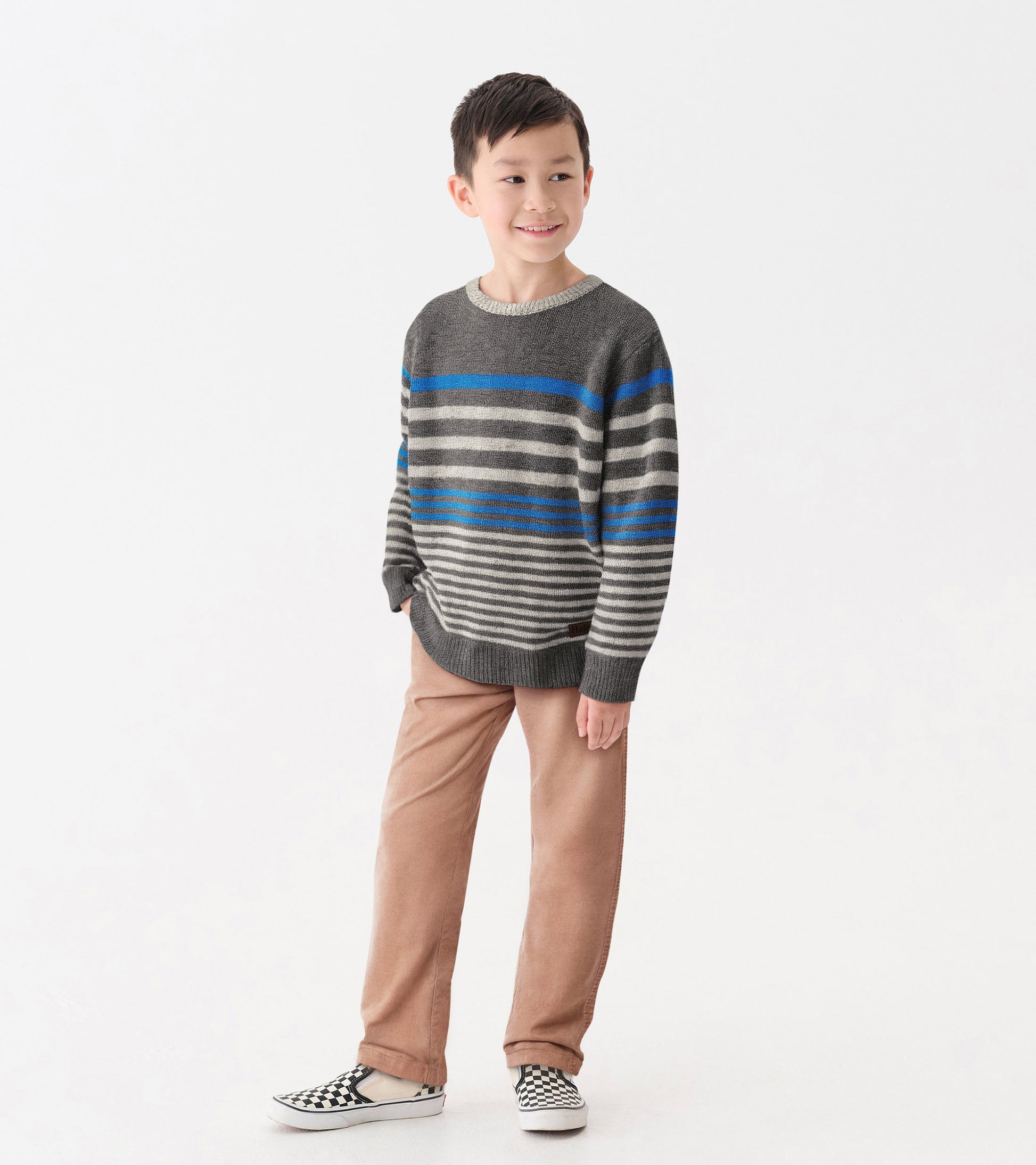 Gray crew neck sweater with blue and gray stripes, worn by a boy with beige pants and checkered shoes.