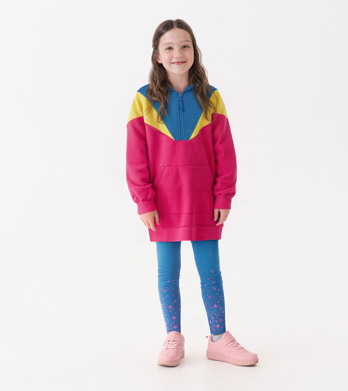 Cozy blue leggings with star pattern, paired with a pink and yellow hoodie, suitable for casual wear.
