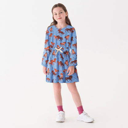 Blue dress featuring a horse print, cinched waist, and long sleeves, suitable for casual wear.