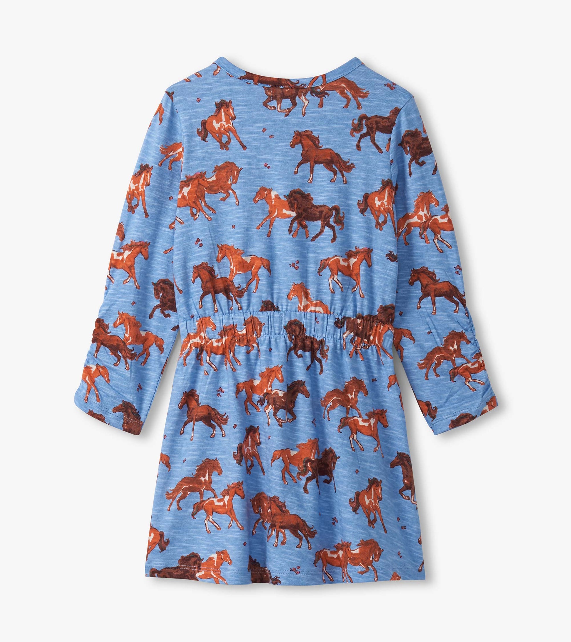 Blue dress featuring a playful horse print, cinched waist, and long sleeves, suitable for casual wear.