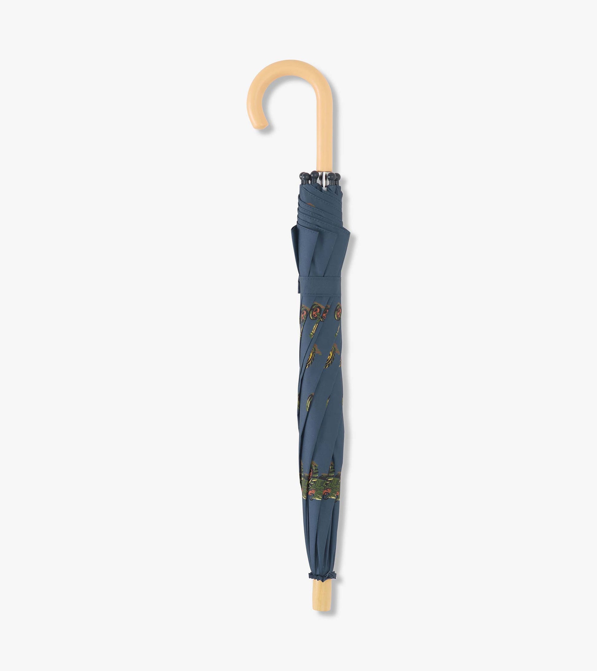 Blue umbrella featuring tractor graphics, with a curved wooden handle and a compact design for easy carrying.