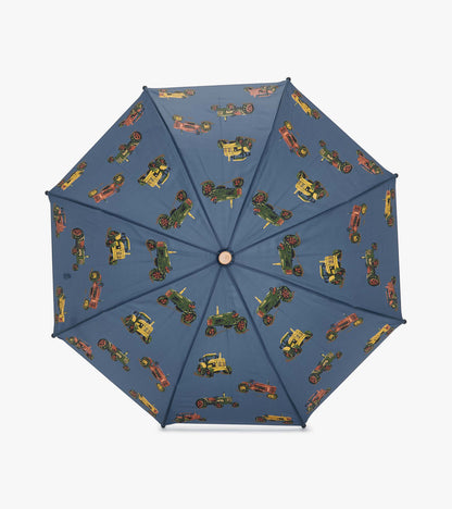 Blue umbrella featuring colorful tractor patterns, designed for boys, with a sturdy structure for outdoor use.
