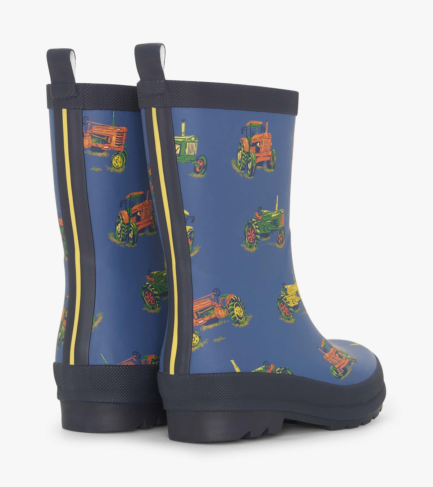 Matte blue rain boots featuring colorful tractor patterns, designed for boys, with a sturdy sole and pull tabs.