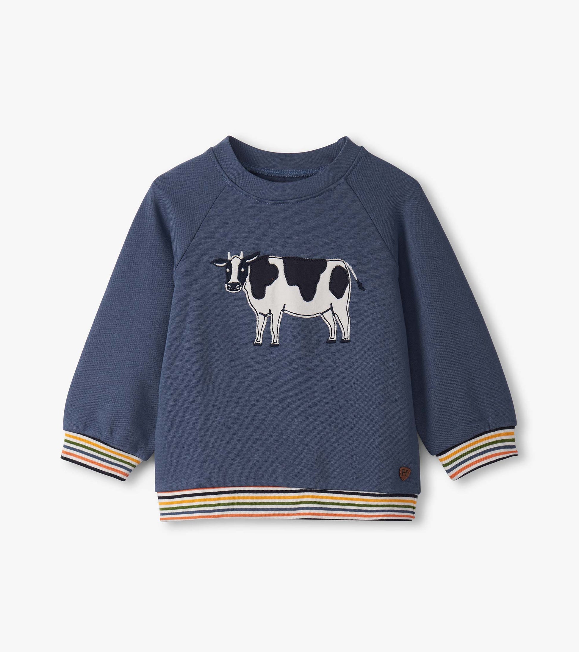 Navy pullover sweatshirt for boys featuring a cow graphic and colorful striped cuffs and hem. Ideal for casual wear.