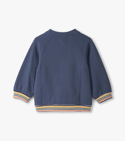 Navy pullover sweatshirt for baby and toddler boys with colorful striped cuffs and hem. Back view shown.