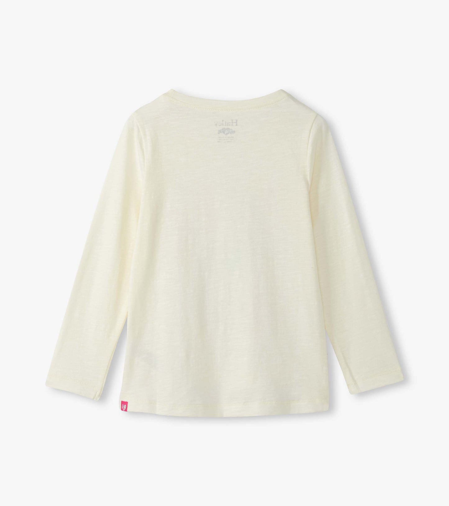 Light cream long sleeve graphic tee with a soft texture and a round neckline, featuring a small logo on the back.