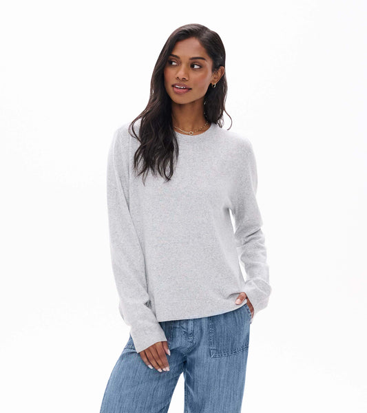 Athletic grey boyfriend sweater with crew neckline, shown on model from the front
