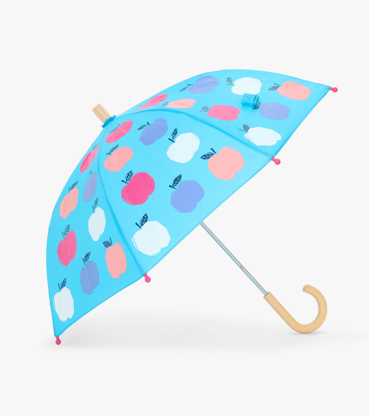 Open kids umbrella with blue canopy, multicolor apple print, and curved light wood handle