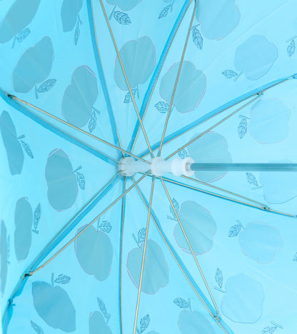 Interior view of blue umbrella showing metal ribs and pale apple print