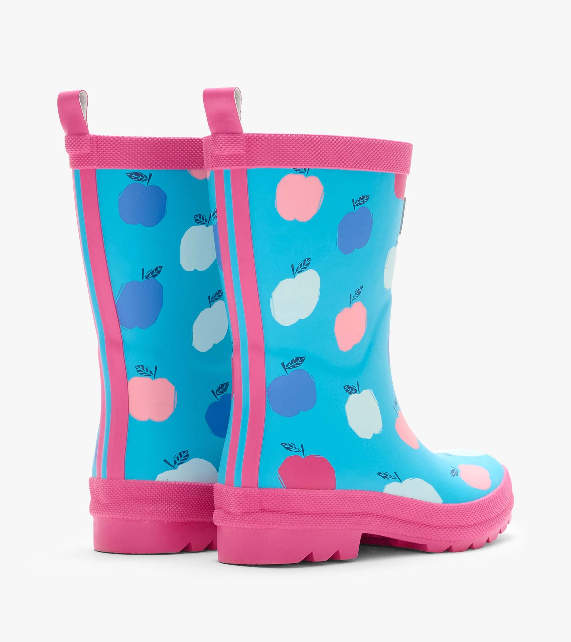 Back view of blue kids rain boots with pink trim, pull tabs, and pink, white, and blue apple print