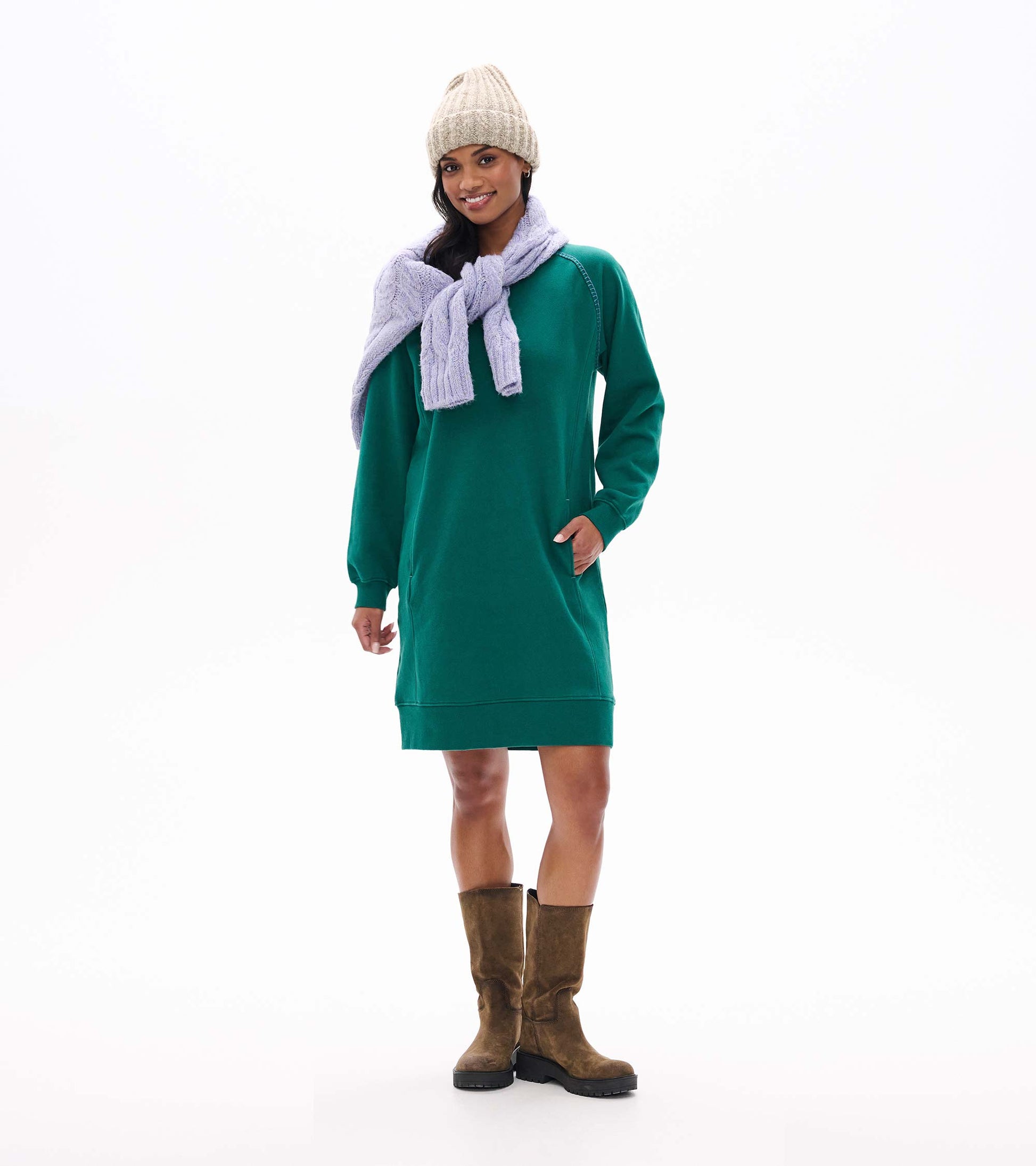 Aventurine green knee-length sweatshirt dress with long sleeves, side pockets, and ribbed hem