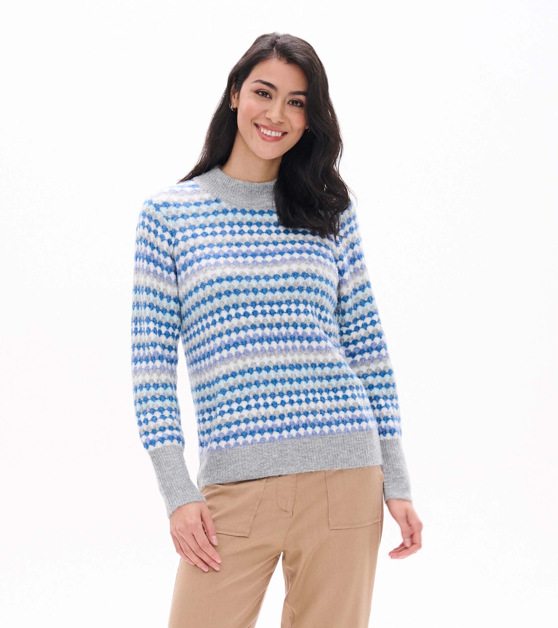 Front view of blue ombre sweater with gray mock neck, cuffs, and hem