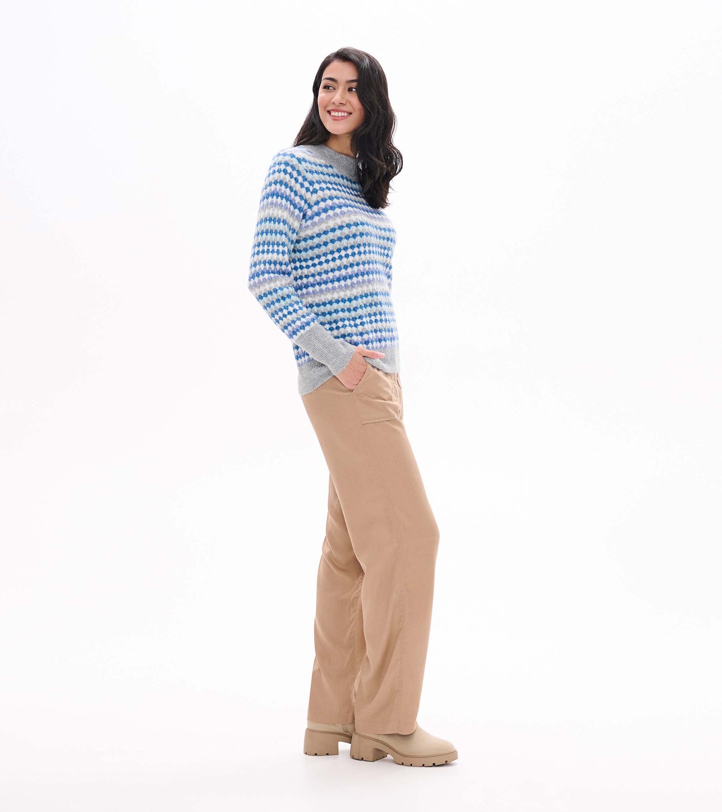 Side view of blue ombre sweater with gray mock neck, cuffs, and hem