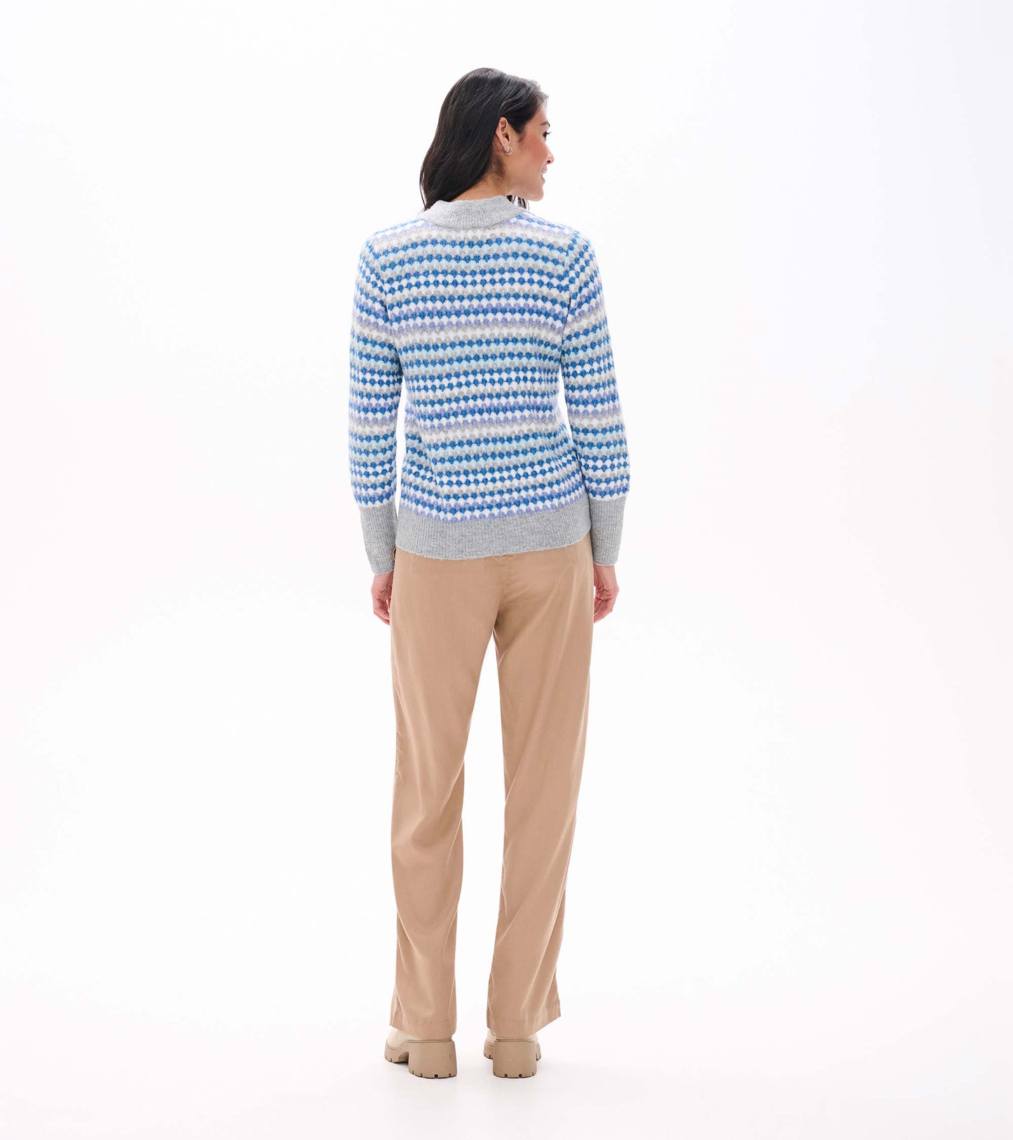 Back view of blue ombre sweater with gray mock neck, cuffs, and hem