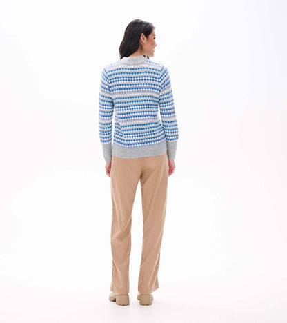 Back view of blue ombre sweater with gray mock neck, cuffs, and hem