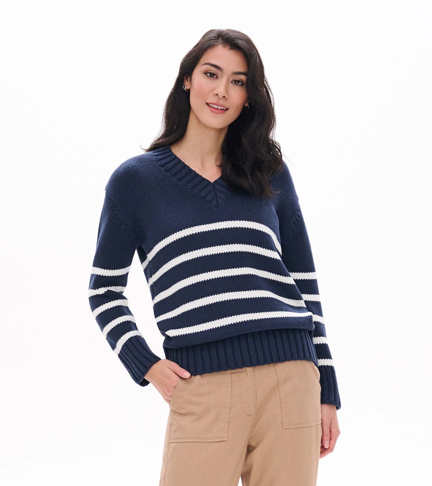 Front view of navy V-neck sweater with cream horizontal stripes and ribbed hem and cuffs
