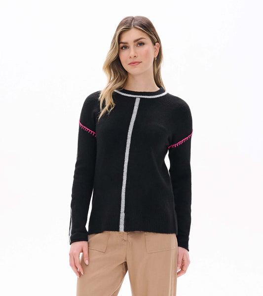 Maeve sweater in black with grey center and sleeve stripes, pink shoulder stitching, shown on model