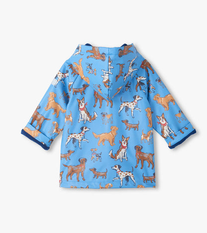 Back view of blue hooded rain coat with allover dog print and dark blue lining at the cuffs