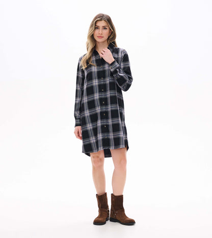 Front view of black and tan plaid shirt dress styled with a collared neckline and curved hem