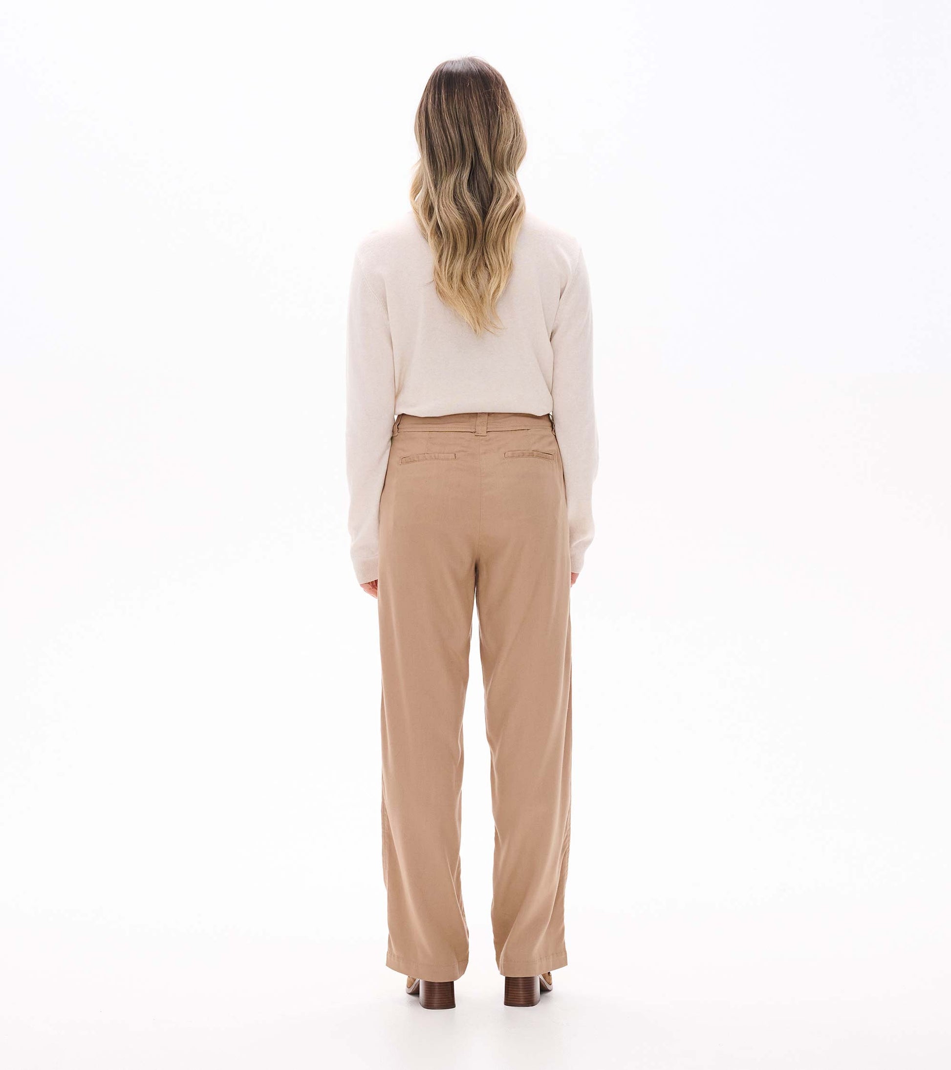 Back view of burro wide leg pants with back welt pockets and straight wide leg fit
