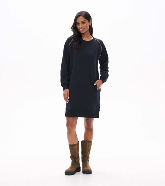 Black crewneck sweatshirt dress with long sleeves, side pockets, and contrast stitching, front view