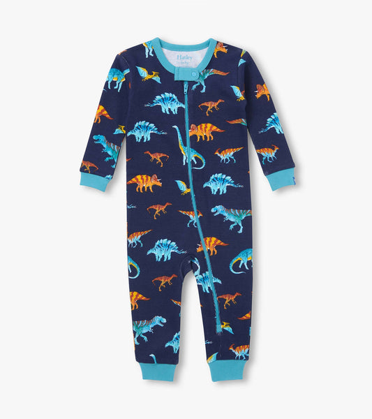 Front view of navy infant coverall with blue and orange dinosaur print, teal trim, and asymmetrical zip closure