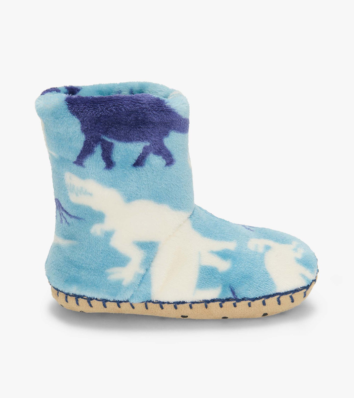 Side view of a blue slipper boot with white and navy dinosaur silhouette print and tan sole