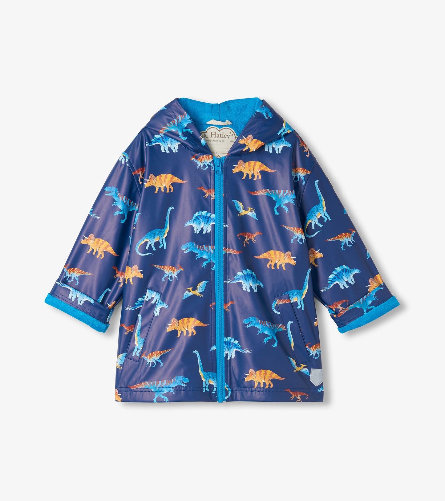 Front view of kids rain coat in navy with blue and orange dinosaur print, hood, zipper, and front pockets