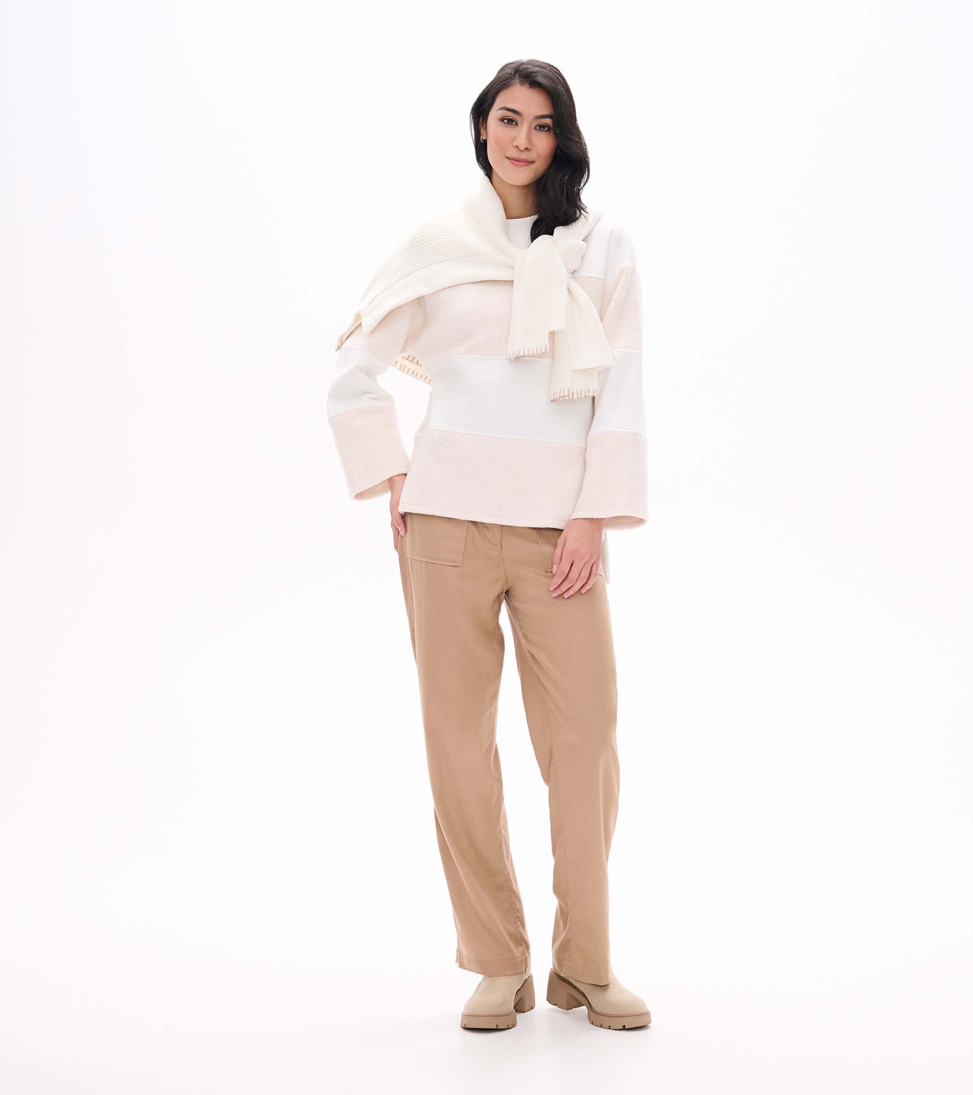 Front view of oatmeal long sleeve top with soft horizontal stripe panels and wide sleeves