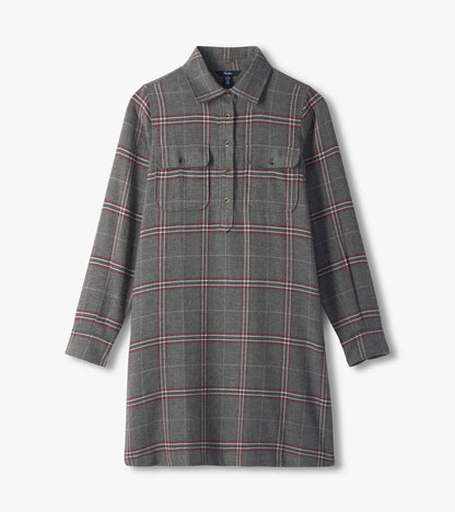 Gray plaid popover dress laid flat with long sleeves, collar, chest flap pockets, and partial button placket