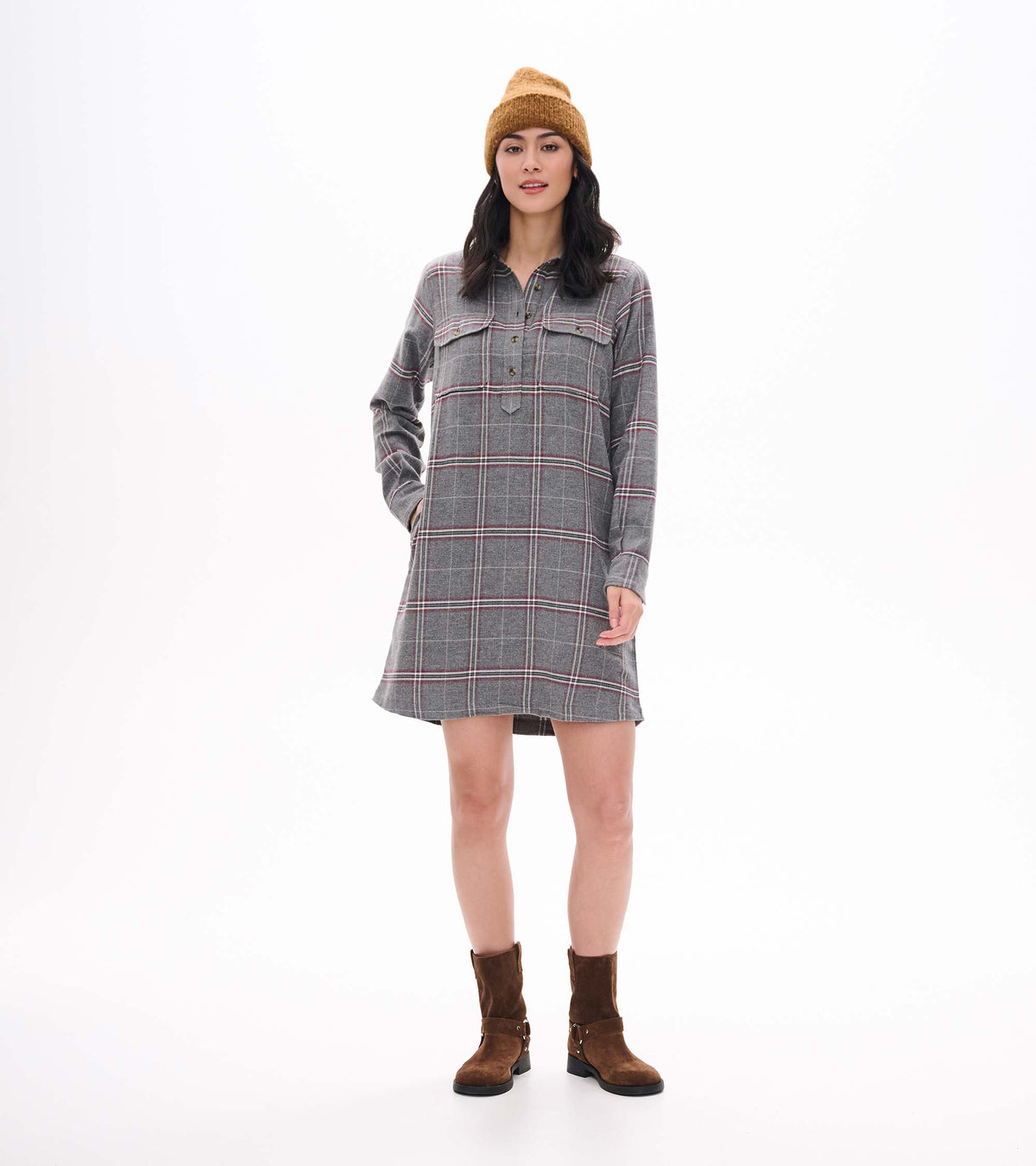 Gray plaid popover dress with long sleeves, chest flap pockets, and button placket shown on model