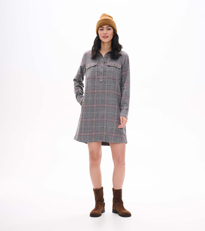 Gray plaid popover dress with long sleeves, chest flap pockets, and button placket shown on model