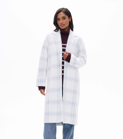 Front view of long white jacket with light blue plaid and notched collar