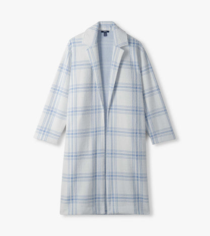 Flat lay of long white jacket with light blue plaid and open front