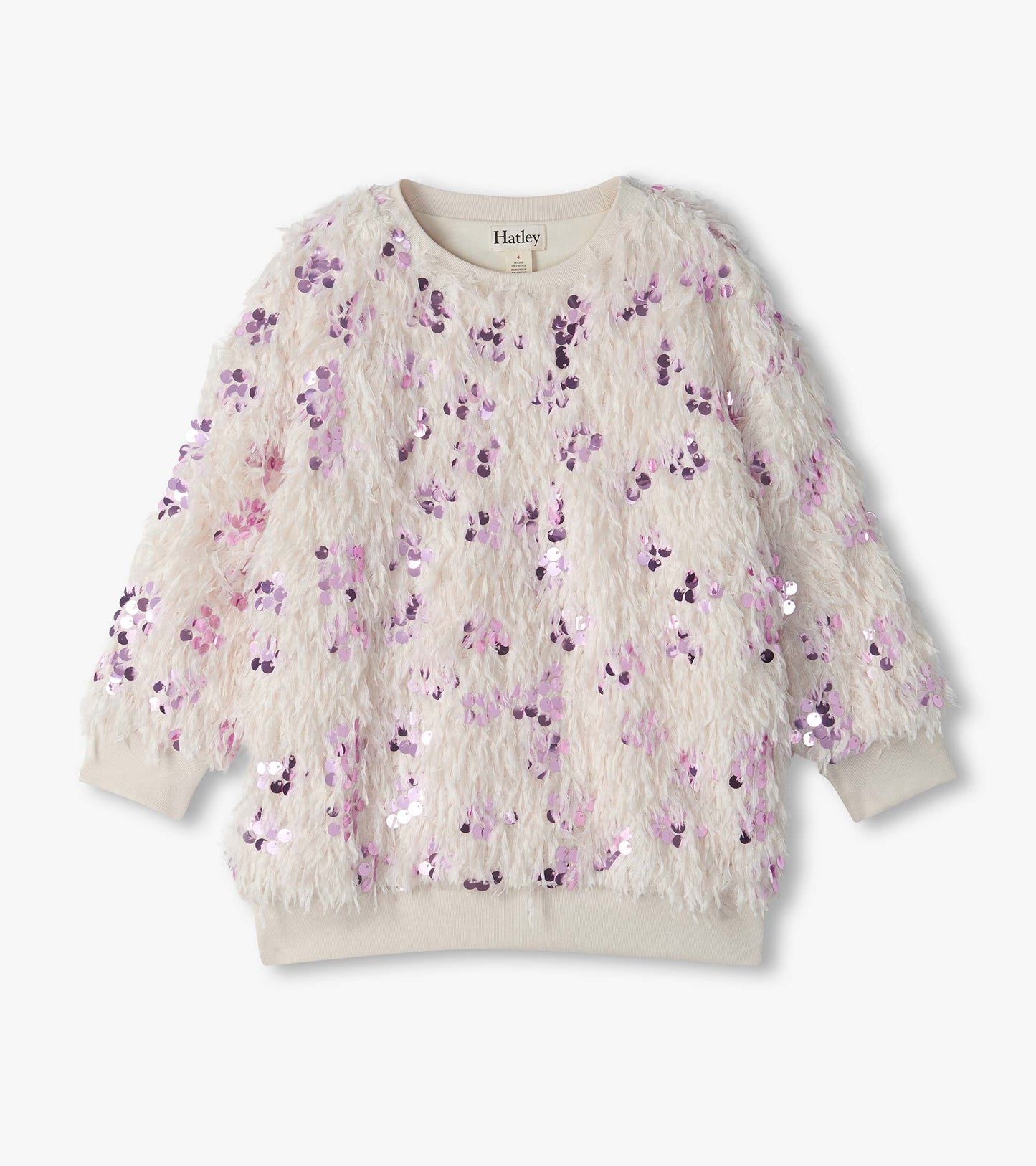Cream pullover with shaggy feather-like texture, pink sequins, and ribbed cuffs, collar, and hem