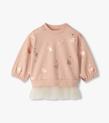 Front view of blush long sleeve top with foil ballerina print and cream tulle hem